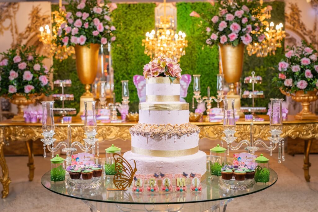 Top Birthday Party Decoration Ideas Luxurious quinceañera setup with a grand cake, florals, and upscale decor in a vibrant setting.