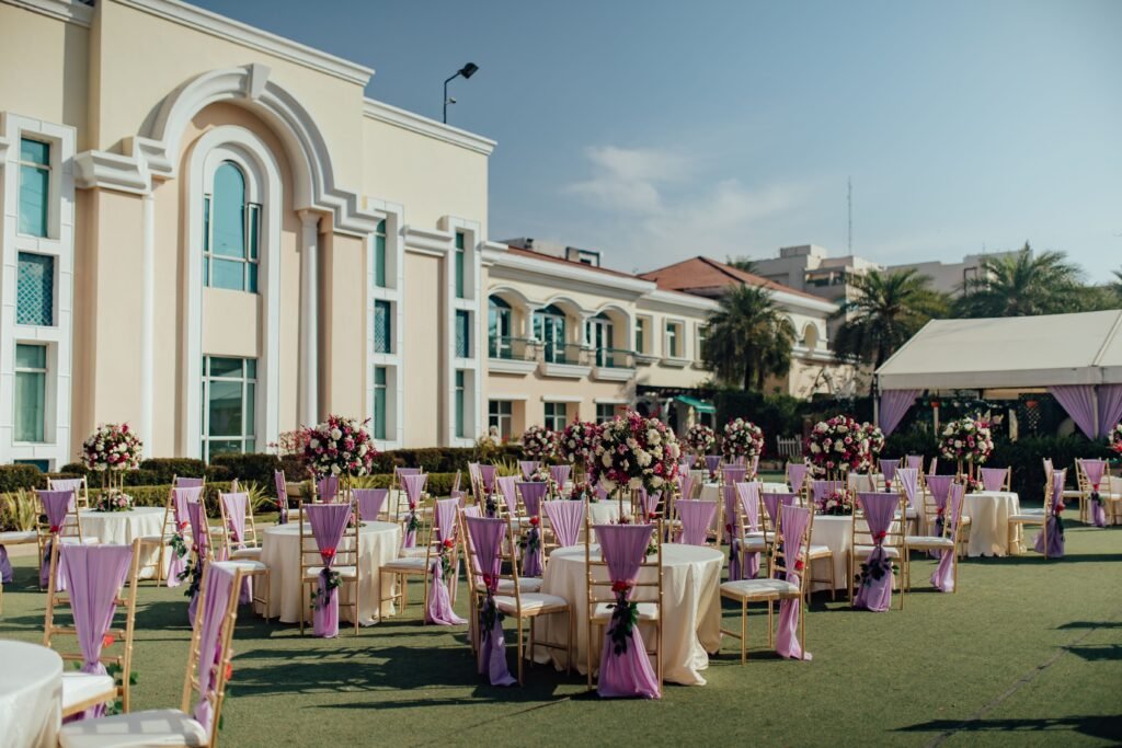 How to Plan a Perfect Wedding Event Luxurious outdoor wedding reception with floral arrangements and elegant decor.